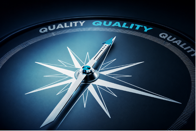 Compass pointing toward the word Quality